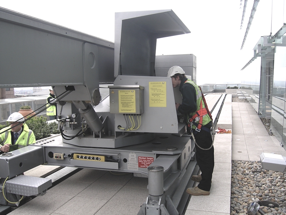 Maintenance being preformed on a building maintenance unit